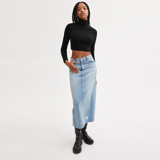 Image of a model wearing Tops. Productname: Signature Knit Cropped Turtleneck in Black colour by brand - Coach Outlet Australia