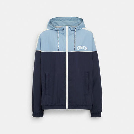 Image of a model wearing Outerwear. Productname: Colorblock Windbreaker in BLUE MULTI colour by brand - Coach Outlet Australia