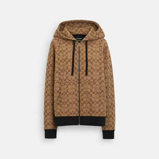 Image of a model wearing Outerwear. Productname: All Over Signature Zip Hoodie in KHAKI MULTI colour by brand - Coach Outlet Australia