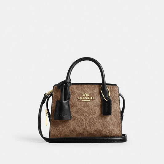 Image of Bags. Productname: Andrea Mini Carryall Bag In Signature Canvas in TAN/BLACK colour by brand - Coach Outlet Australia
