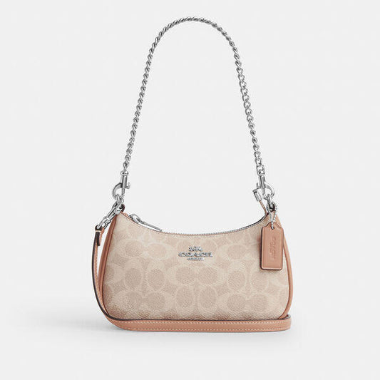 Image of Bags. Productname: Teri Mini Crossbody Bag In Signature Canvas in SV/SAND/TAUPE colour by brand - Coach Outlet Australia