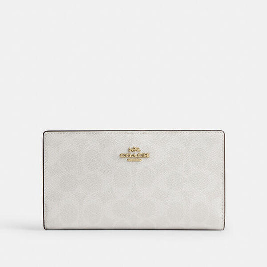 Image of Wallets & Money Clips. Productname: Slim Zip Wallet In Signature Canvas in WHITE/CHALK colour by brand - Coach Outlet Australia