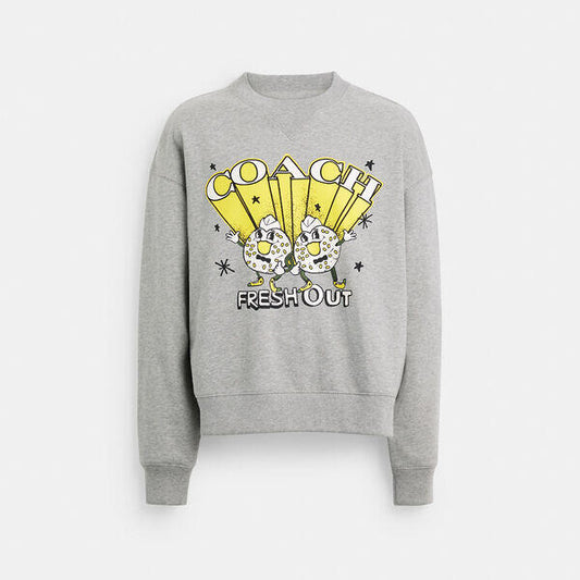 Image of a model wearing Outerwear. Productname: Bagel Crewneck Sweatshirt in HEATHER GREY colour by brand - Coach Outlet Australia