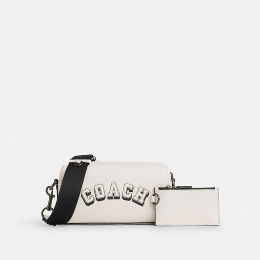 Image of Bags. Productname: Axel Crossbody Bag With Varsity Motif in CHALK/BLACK colour by brand - Coach Outlet Australia