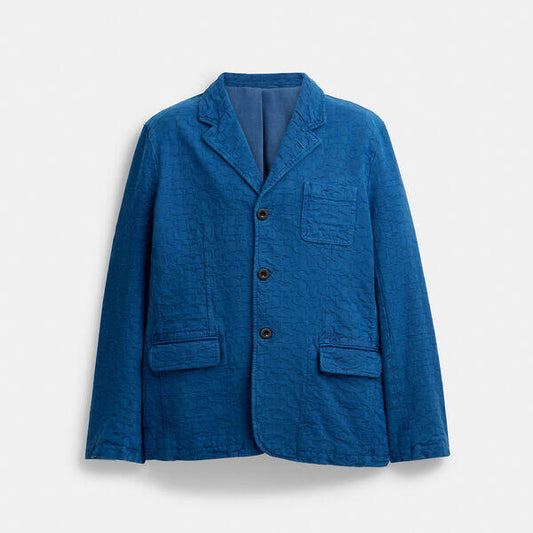 Image of a model wearing Outerwear. Productname: Denim Blazer in Royal Blue colour by brand - Coach Outlet Australia