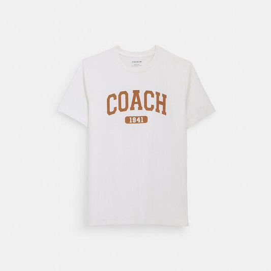 Image of a model wearing Tops. Productname: Varsity T-Shirt In Organic Cotton in IVORY colour by brand - Coach Outlet Australia