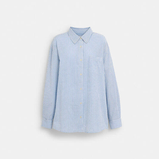 Image of a model wearing Tops. Productname: Striped Seersucker Button Down Shirt in BLUE MULTI colour by brand - Coach Outlet Australia