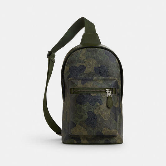 Image of Accessories. Productname: West Pack In Signature Canvas With Camo Print in DARK SHAMROCK MTI colour by brand - Coach Outlet Australia