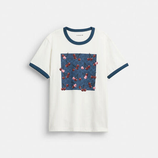 Image of a model wearing Tops. Productname: Signature Square Cherry T-Shirt In Organic Cotton in WHITE/NAVY colour by brand - Coach Outlet Australia