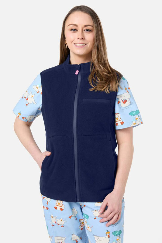 Image of a model wearing Outerwear. Productname: Navy Polar Fleece Scrub Vest in Navy colour by brand - Scrubs With Love