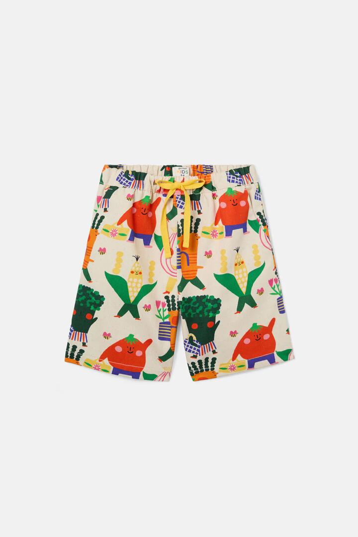 Image of a model wearing Shorts. Product name - Walkabout Kids Shorts in Cream colour by brand - Gorman