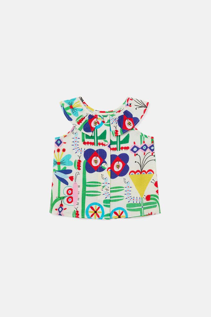 Image of a model wearing Tops. Product name - Mini Hideout Kids Top in Cream colour by brand - Gorman