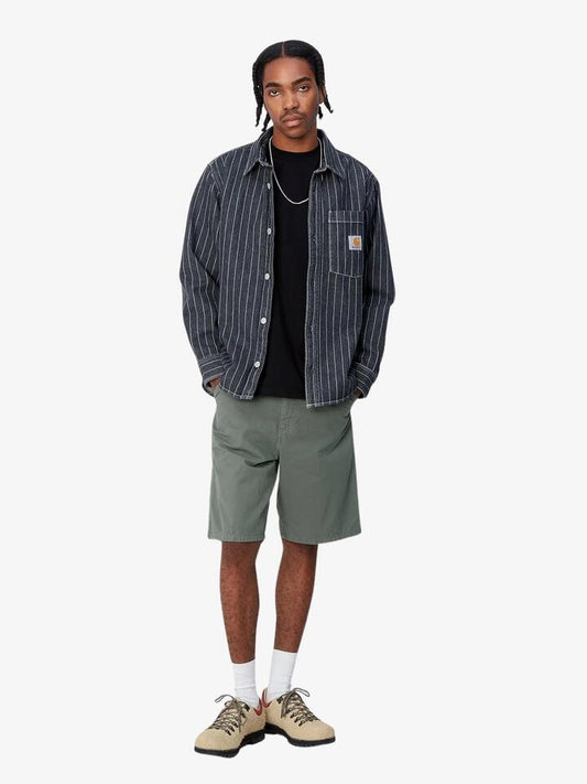 Image of a model wearing Shorts. Productname: Carhartt Wip Single Knee Short in Park Garment Dyed colour by brand - Carhartt Wip