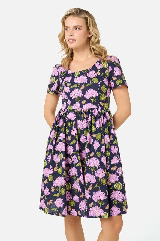 Image of a model wearing Dress. Productname: Geranium Flower Mini Dress in Navy colour by brand - Princess Highway