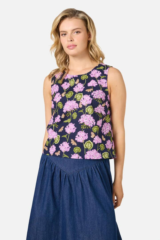 Image of a model wearing Tops. Productname: Geranium Flower Shell Top in Navy colour by brand - Princess Highway
