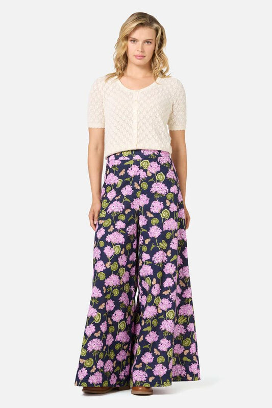 Image of a model wearing Pants. Productname: Geranium Flower Wide Leg Pant in Navy colour by brand - Princess Highway