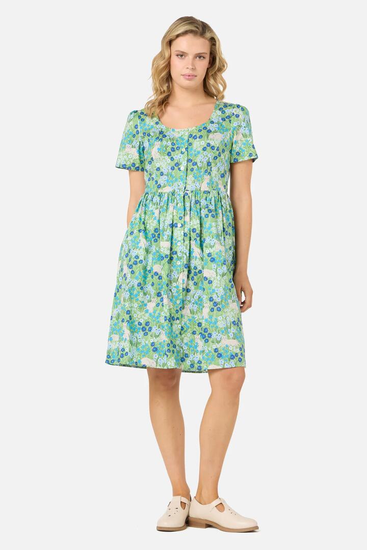 Image of a model wearing Dress. Productname: Cat & Flora Short Sleeve Dress in Blue colour by brand - Princess Highway
