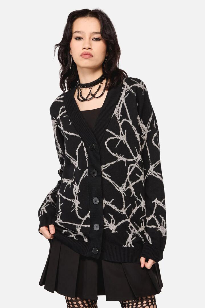 Image of a model wearing Outerwear. Productname: Sharp Hearted Oversized Cardigan in Black colour by brand - Dangerfield