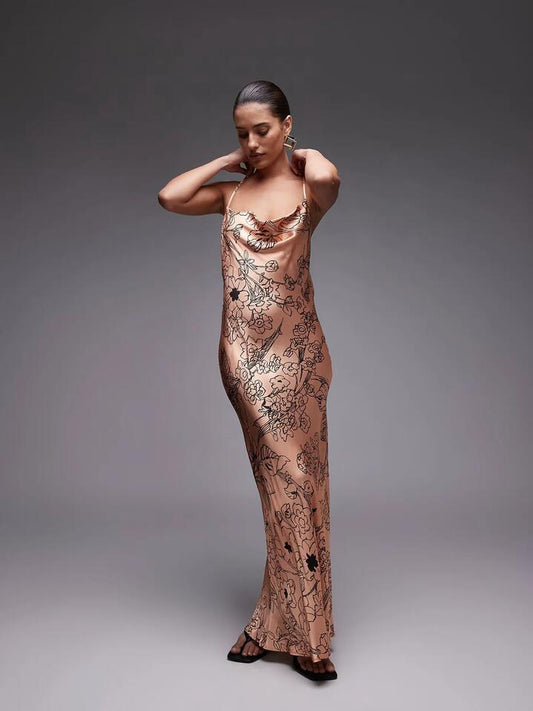 Image of a model wearing Dress. Productname: Topshop Cowl Maxi Slip Dress in Pink colour by brand - Topshop