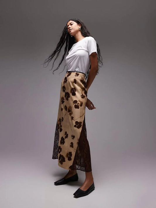 Image of a model wearing Skirts. Productname: Topshop Hanky Hem Skirt in Brown colour by brand - Topshop