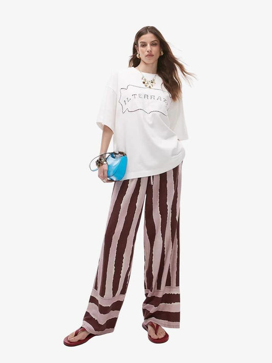 Image of a model wearing Tops. Productname: Topshop La Terazzo Oversized Tee in White colour by brand - Topshop