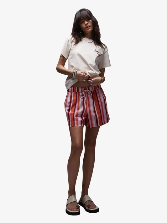 Image of a model wearing Tops. Productname: Topshop Graphic Seamans Bay Tee in Pink colour by brand - Topshop