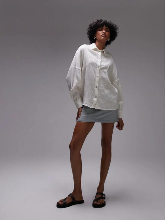 Image of a model wearing Tops. Productname: Topshop Cotton Casual Shirt in Ivory colour by brand - Topshop