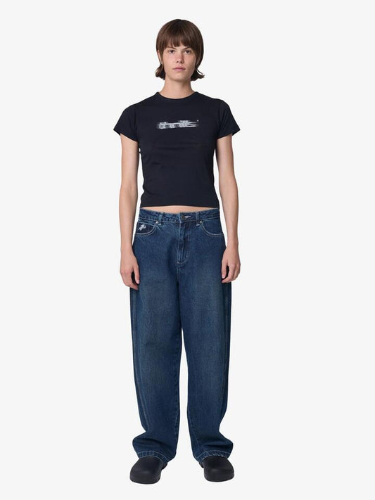 Image of a model wearing Denim. Productname: Worship Try Again Sloucher Jean in DIRTY MID BLUE/TOBACCO STITCH colour by brand - Worship