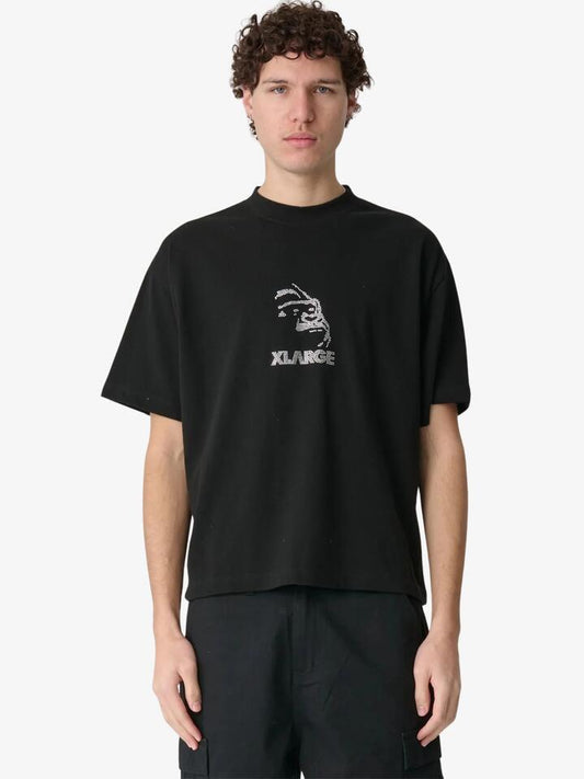 Image of a model wearing Tops. Productname: Xlarge Rhinestone Gorilla Fit Tee in Solid Black colour by brand - Xlarge