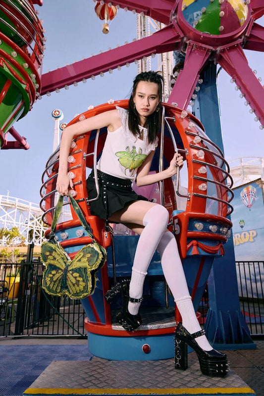 Image of a model wearing Tops. Productname: Entomology Ribbed Tank Top in Cream colour by brand - Dangerfield