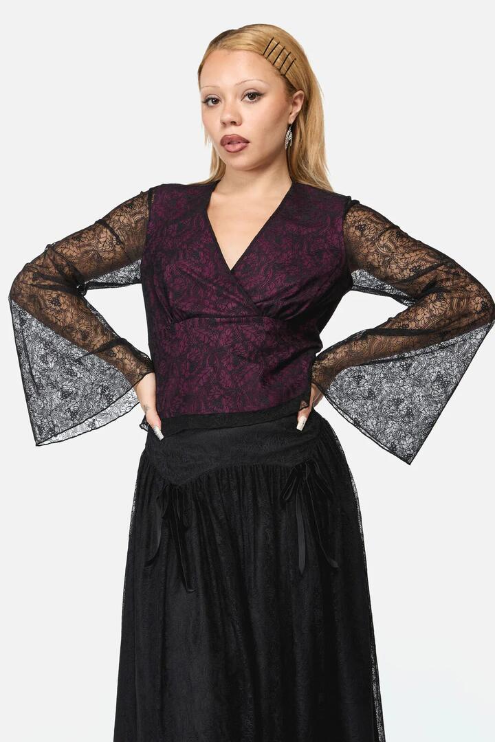 Image of a model wearing Tops. Productname: Fiona Lace Top in Black colour by brand - Black Friday
