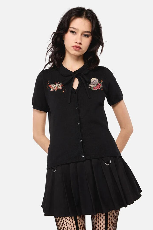 Image of a model wearing Outerwear. Productname: All Hallows Eve Tattoo Placement Cardigan in Black colour by brand - Dangerfield