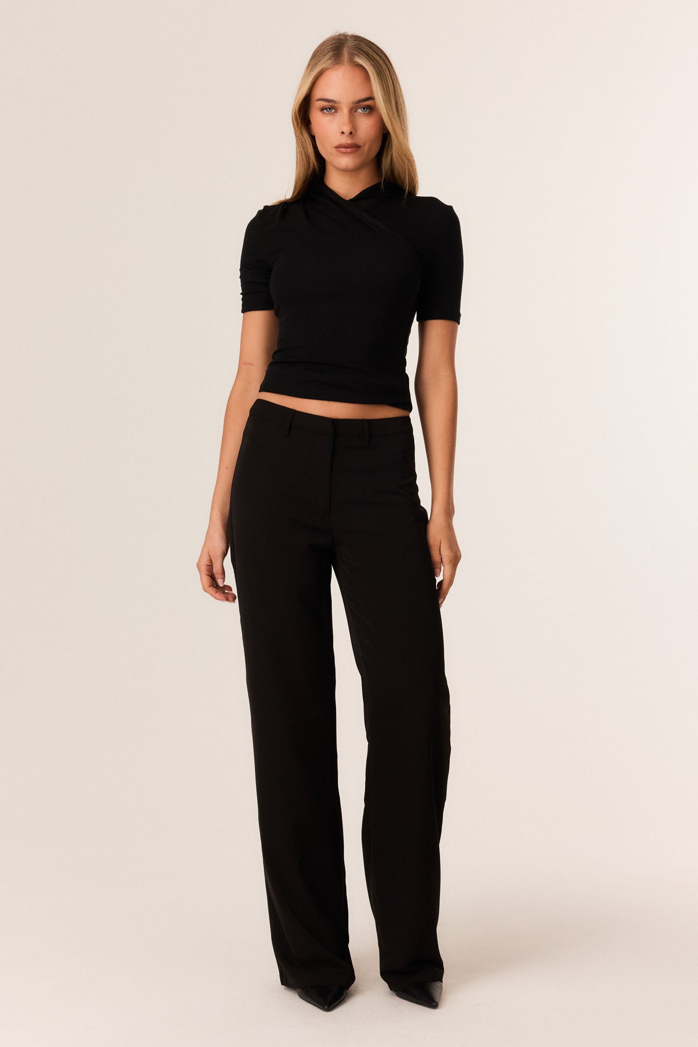 Image of a model wearing Pants. Productname: SNDYS CHASE PANTS in Black colour by brand - SNDYS