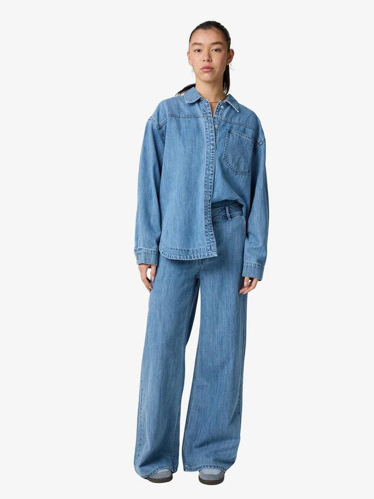 Image of a model wearing Denim. Productname: Lulu & Rose Bria Denim Palazzo in Light Blue colour by brand - Lulu & Rose