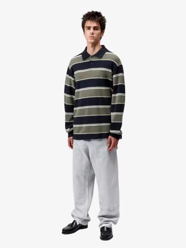 Image of a model wearing Tops. Productname: Carhartt Wip L/S Malone Rugby Shirt in Malone Stripe/Darkbrick colour by brand - Carhartt Wip