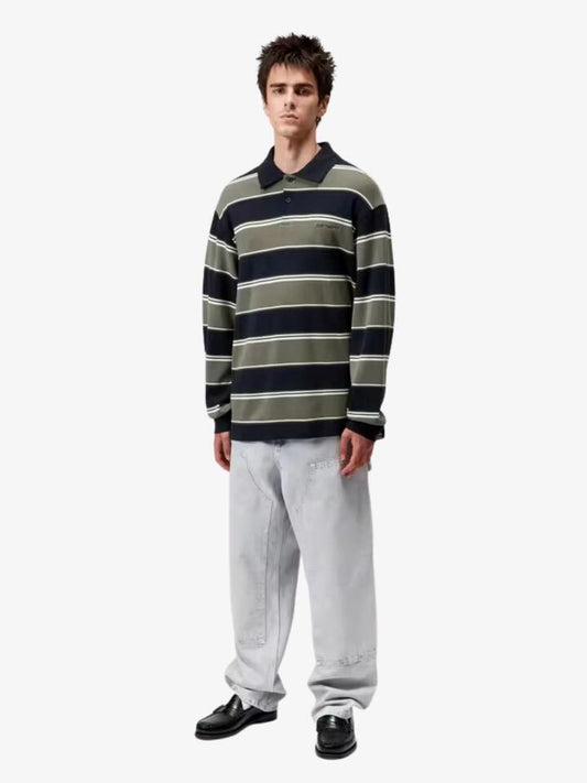 Image of a model wearing Tops. Productname: Carhartt Wip Long Sleeve Malone Rugby Shirt in Malone Stripe/Darkbrick colour by brand - Carhartt Wip