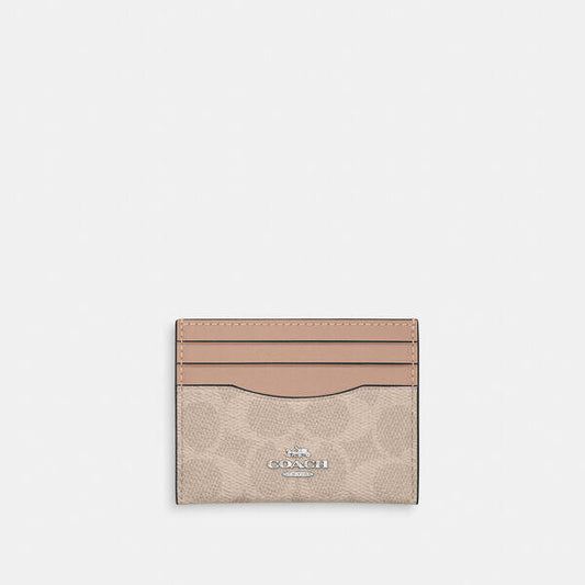 Image of Accessories. Productname: Slim Id Card Case In Signature Canvas in SV/SAND/TAUPE colour by brand - Coach Outlet Australia