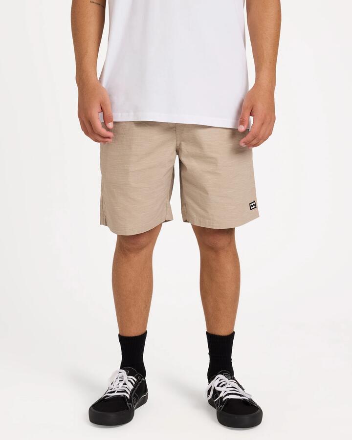 Image of a model wearing Shorts. Product name - Billabong Mens Slub Walkshorts Straw in Straw colour by brand - Billabong