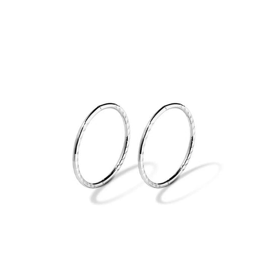 Image of Earrings. Productname: 14mm Twist Sleeper Earrings in Sterling Silver in Silver colour by brand - Bevilles