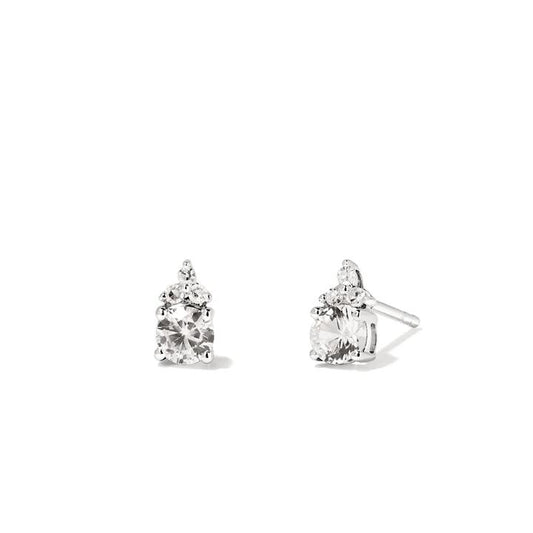 Image of Earrings. Productname: Birthstone Teardrop Stud Earrings with Created White Sapphire and 0.05tw of Laboratory-Grown Diamonds in Sterling Silver and Platinum in Diamond colour by brand - Bevilles