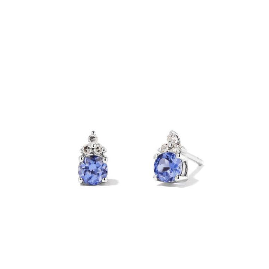 Image of Earrings. Productname: Birthstone Teardrop Stud Earrings with Created Tanzanite and 0.05tw of Laboratory-Grown Diamonds in Sterling Silver and Platinum in Diamond colour by brand - Bevilles
