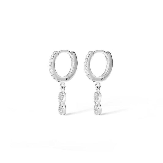 Image of Charms. Productname: Cubic Zirconia Infinity Charm Huggie Earrings in Sterling Silver in Silver colour by brand - Bevilles