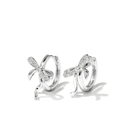 Image of Earrings. Productname: Cubic Zirconia Ribbon Huggie Earrings in Sterling Silver in Silver colour by brand - Bevilles