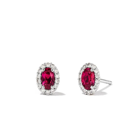 Image of Earrings. Productname: Oval Created Ruby Halo Stud Earrings with 0.14tw of Laboratory-Grown Diamonds in Sterling Silver and Platinum in Diamond colour by brand - Bevilles