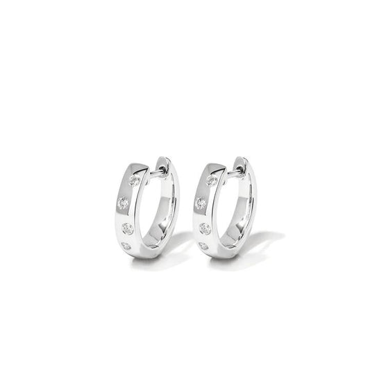 Image of Earrings. Productname: Hammer Set Huggie Earrings with 0.10tw of Laboratory-Grown Diamonds in Sterling Silver and Platinum in Diamond colour by brand - Bevilles
