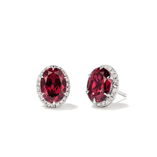 Image of Earrings. Productname: Oval Halo Created Ruby Stud Earrings with 0.22tw of Laboratory-Grown Diamonds in Sterling Silver and Platinum in Diamond colour by brand - Bevilles