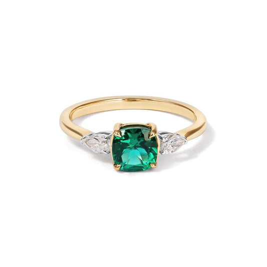 Image of Jewelry. Productname: Three Stone Ring with Created Emerald and 0.20tw of Laboratory-Grown Diamonds in 9kt Yellow Gold in Diamond colour by brand - Bevilles