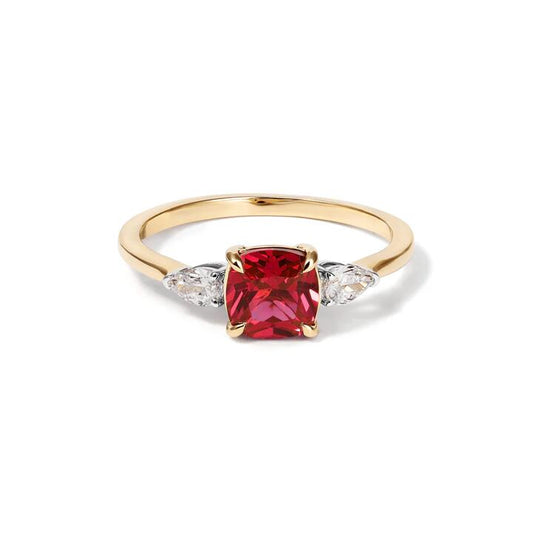 Image of Jewelry. Productname: Three Stone Ring with Created Ruby and 0.20tw of Laboratory-Grown Diamonds in 9kt Yellow Gold in Diamond colour by brand - Bevilles