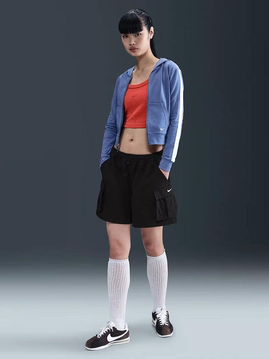 Image of a model wearing Shorts. Productname: Nike NSW Mid-Rise Loose 5" Cargo Shorts in Black/Sail colour by brand - Nike
