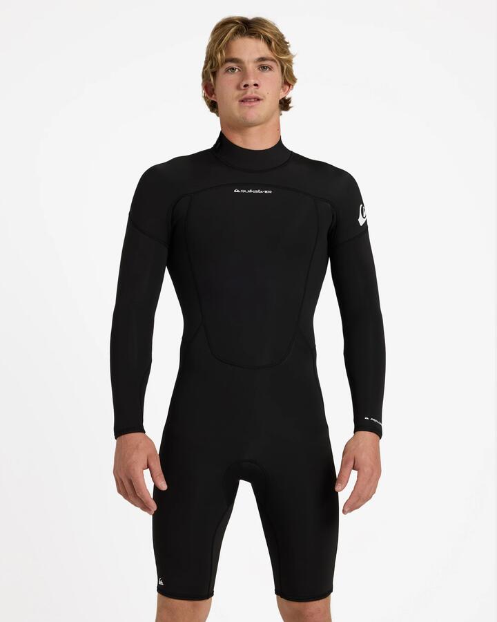 Image of a model wearing Tops. Productname: Quiksilver Mens 2/2Mm Prologue+ Long Sleeve Back Zip Springsuit Black - in Black colour by brand - Quiksilver